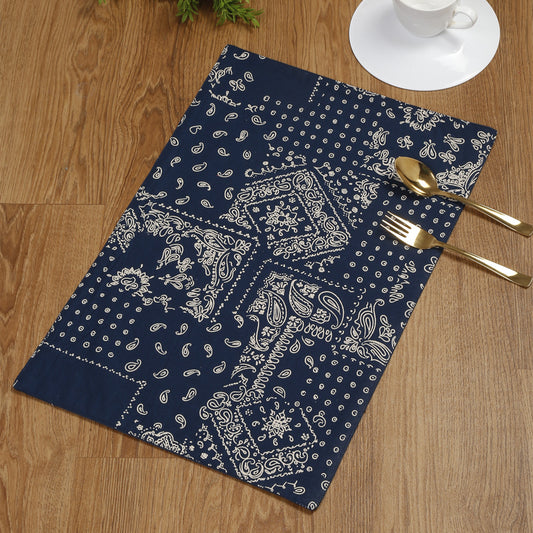 Set of 4 high-quality cotton placemats in a calming blue color, adorned with elegant gold prints.