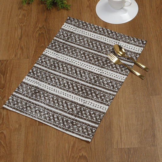 Elevate your dining experience with this set of 4 premium cotton placemats in rich brown, featuring stylish striped prints