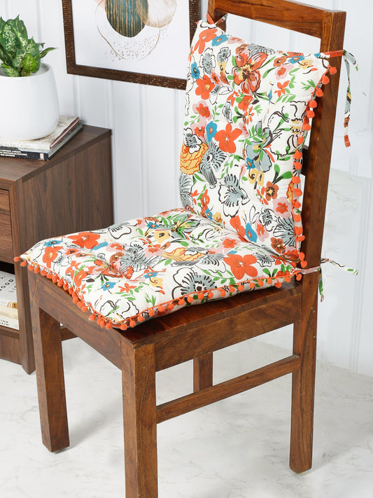 Eye-catching chair pad with a bold floral pattern in shades of white and multi, adding a pop of modern style to any chair.